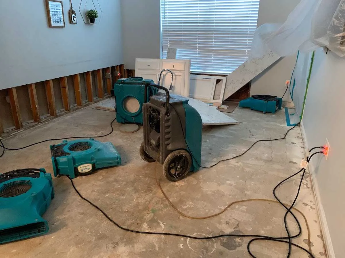 Dehumidifier in flood-cut room for Water Extraction & Removal in Winder